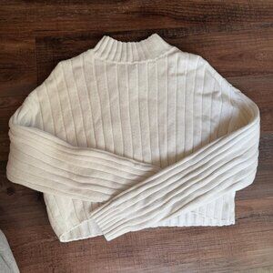 White turtleneck sweater